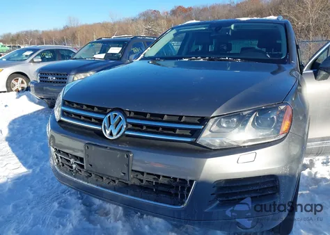 2012 Volkswagen Touareg Vr6 Sport z USA, uszkodzony, nr VIN WVGEF9BP3CD005804